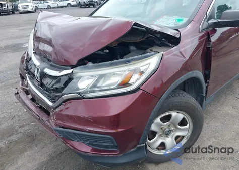 2015 Honda Cr-V Lx z USA, uszkodzony, nr VIN 2HKRM3H34FH505238